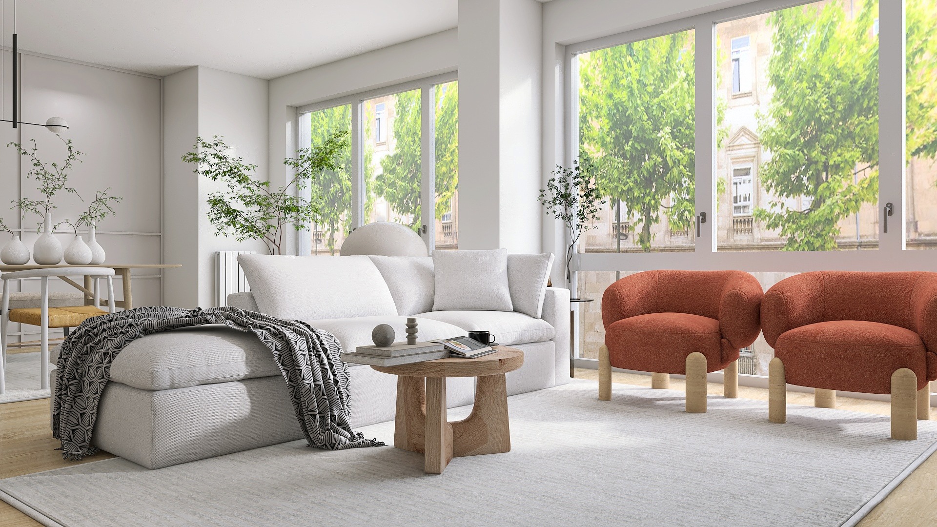 salon con sofa blanco y butacas terracota, grandes ventanales blancos y mesita de madera redonda